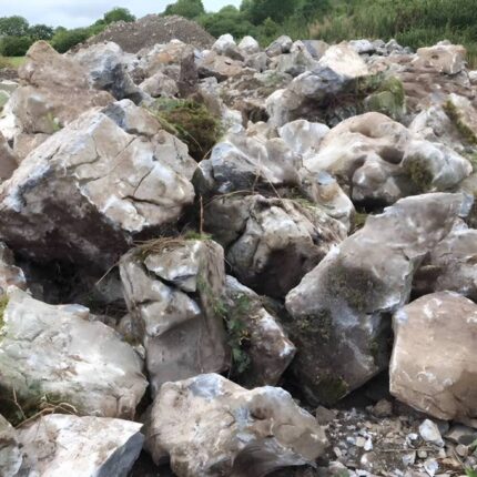 8 wheeler 20 ton tipper load weathered limestone